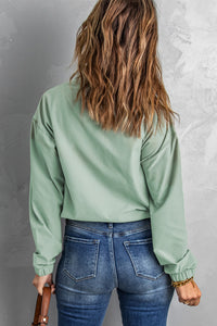 Zip Front Pocketed Pullover Sweatshirt